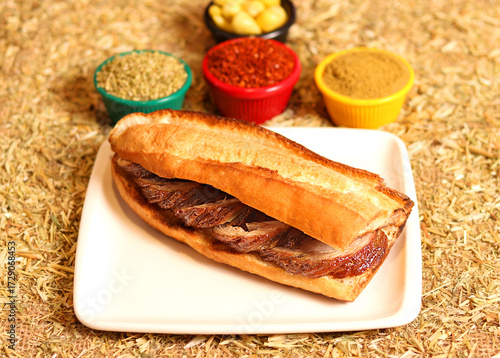 a art photo of a fried kokorech  sandwich
