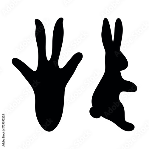 Silhouette of a rabbit footprint and a rabbit in profile on a white background