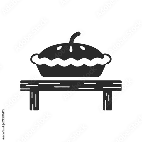 Rustic black and white apple pie icon on table