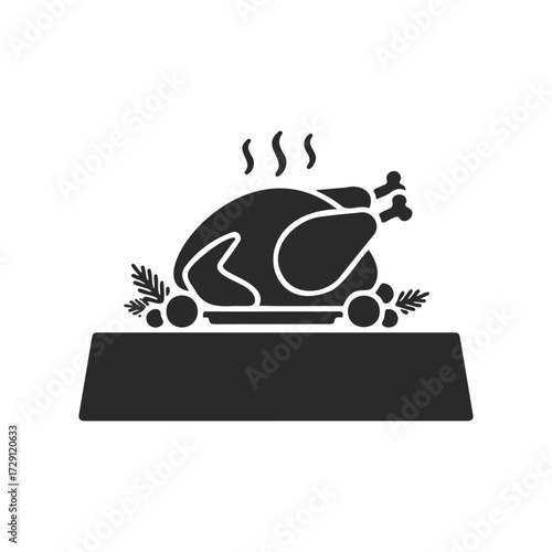 Silhouette of a roasted thanksgiving turkey on a platter with vegetables