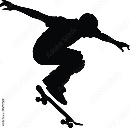 Skateboarder performing aerial trick silhouette action