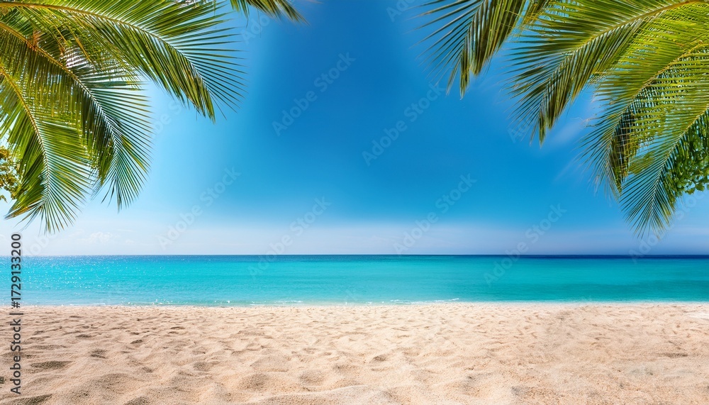 Fototapeta premium beautiful sand beach under palm leaves horizon over the sparkling blue sea idyllic summertime background concept with copy space vacation in south sea idyll empty nature on a cheerful day
