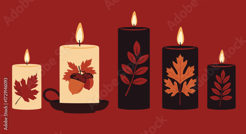 Autumnal themed pillar candles with leaf and acorn motifs creating a cozy atmosphere.