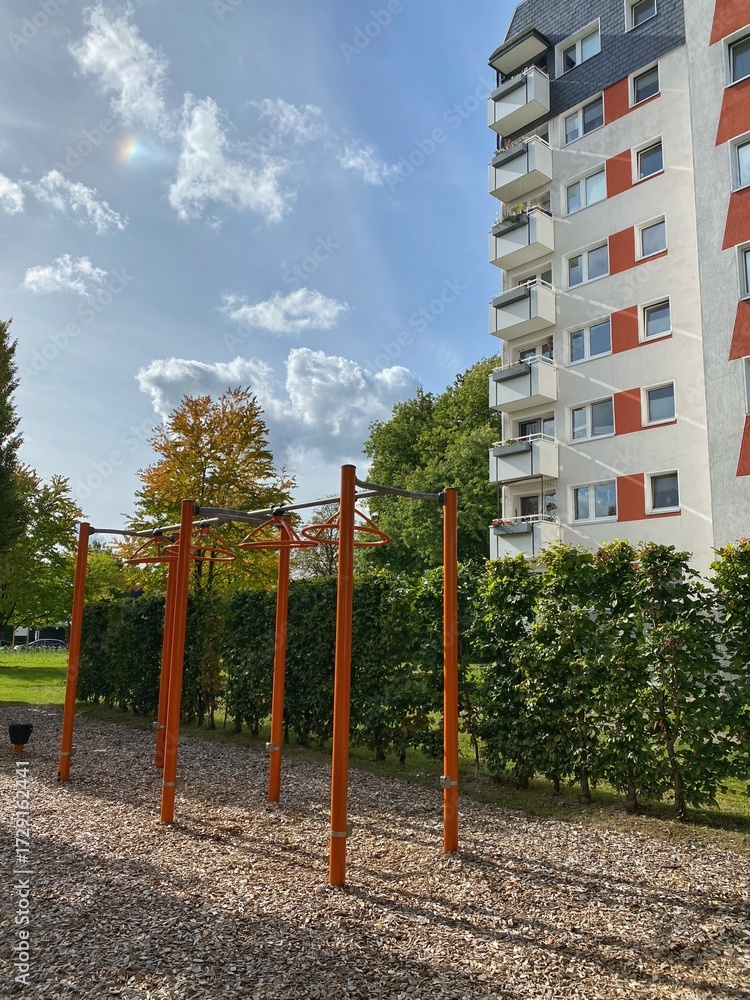 Fototapeta premium Outdoor Fitness Area in urban Green Space Near Residential building