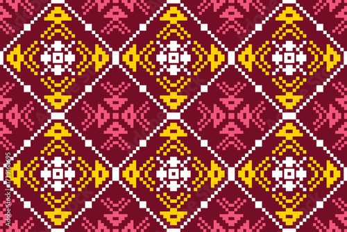 Pixel art Thai textile pattern in red, yellow, white, and pink, arranged in continuous diamond shapes.