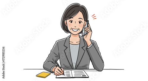 Woman in a business suit talking on the phone and writing notes