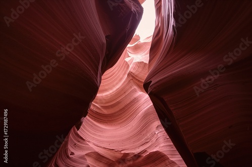 Inside the tight corridors of a twisting sandstone canyon with textured walls