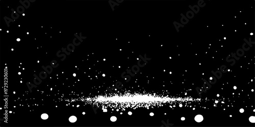 Black ink splat and falling snowflakes on a winter night sky background