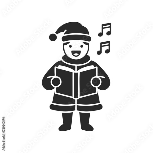 Smiling child singing christmas carols in winter outfit