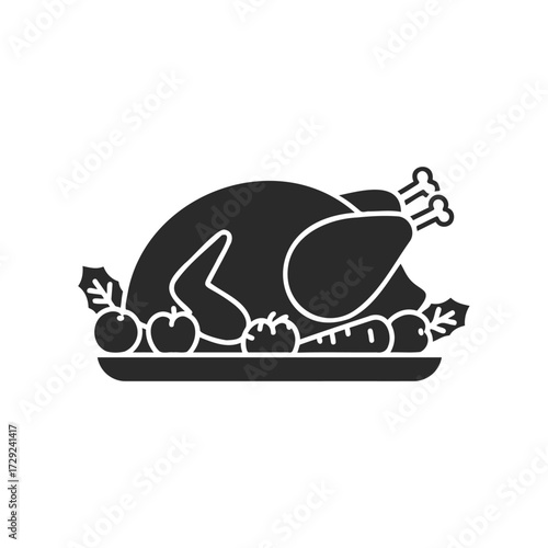 Silhouette of roasted thanksgiving turkey with vegetables on plate