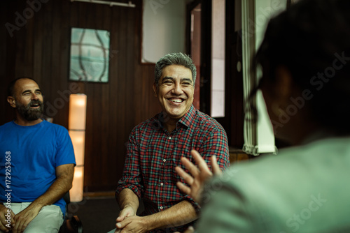 People talking in a group therapy session