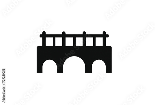 silhouette of arch bridge