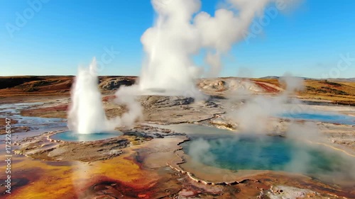 Powerful geysers erupt and hot springs bubble around a volcanic landscape, showcasing geothermal activity in a dynamic timelapse powerful geysers erupt, water, volcano