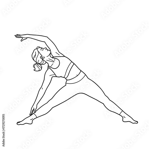 Woman practicing yoga in triangle pose with a focused expression  