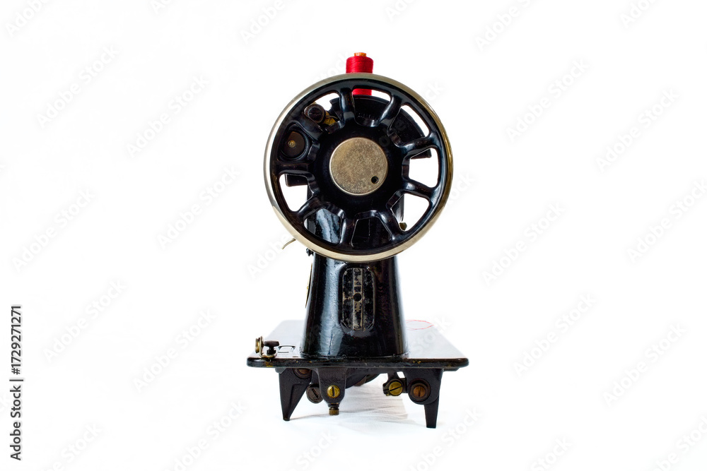 Obraz premium black vintage sewing machine on white background