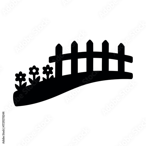 Silhouette of a charming picket fence with blooming flowers in a garden setting