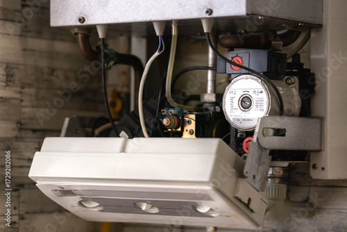 An open electric water heating boiler, ready for repair.