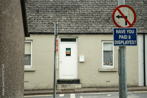 small house with Irish flag