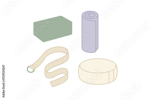 Collection of essential yoga and meditation accessories including a block, rolled mat, strap, and round cushion for practice