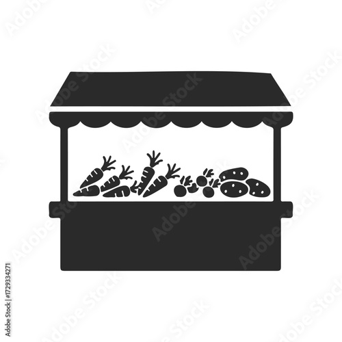 Silhouette of market stall displaying carrots and potatoes