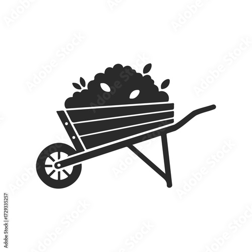 Silhouette of wheelbarrow filled with soil and leaves icon