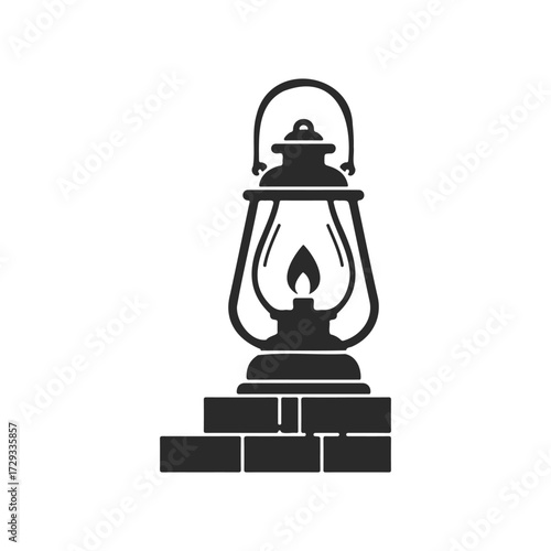 Vintage kerosene lantern silhouette on brick wall