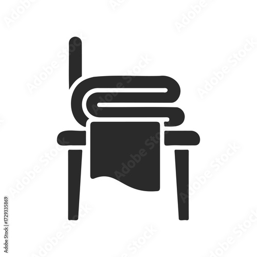 Minimalist black folding chair icon with blanket
