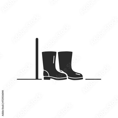 Silhouette of rain boots and umbrella in minimalist design