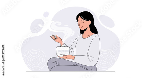 Woman Meditating And Enjoying Aromatherapy With Essential Oil Diffuser For Relaxation