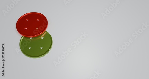 red and green buttons placed on a white background