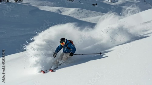 Man ski descends off piste in snowy mountain, with powder spraying, winter extreme sport and recreation concept footage.