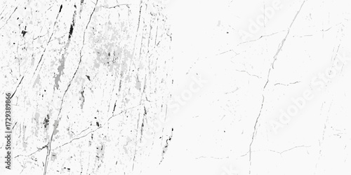 Abstract textured background with cracks and speckled patterns in monochrome tones