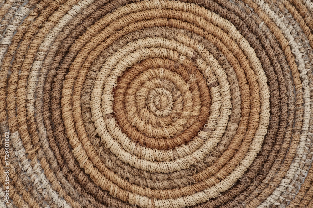 Fototapeta premium Handcrafted Round Wall Hanging in Warm Natural Shades