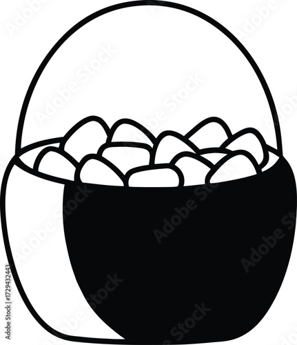 Orange Pumpkin Bucket Filled with Candy Corn