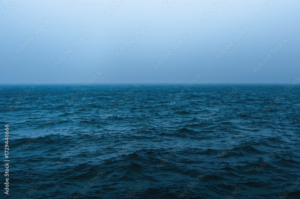 Obraz premium Deep navy sea wave with misty atmosphere and marine scenery