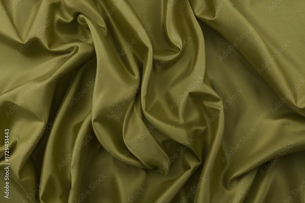 Obraz premium Olive green cloth with gentle folds and subtle shading, exuding elegance.