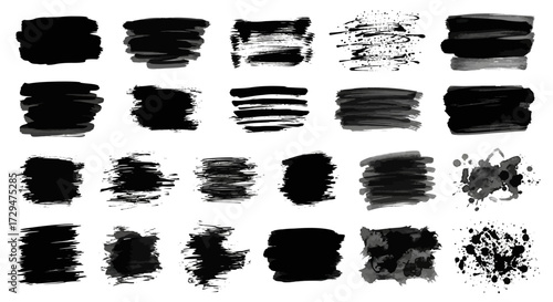 Collection of diverse black ink brush strokes and splatters on a white background representing artistic expression and texture