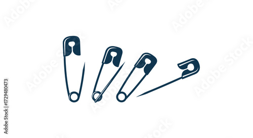 A collection of four simple safety pins arranged in a line on a white background