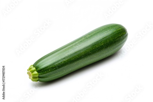 Raw fresh zucchini on a whi...