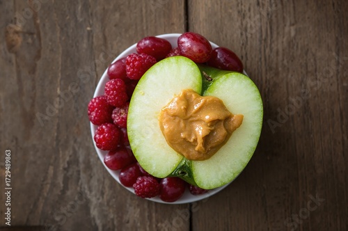 Sliced green apple topped w...