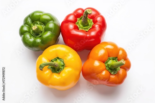 Four colorful peppers isola...