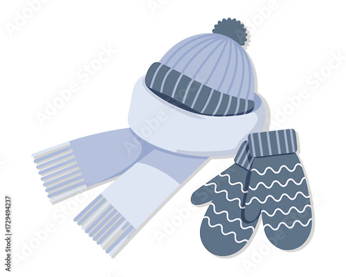 Winter clothes isolated on white background with hat, scarf and mittens in blue