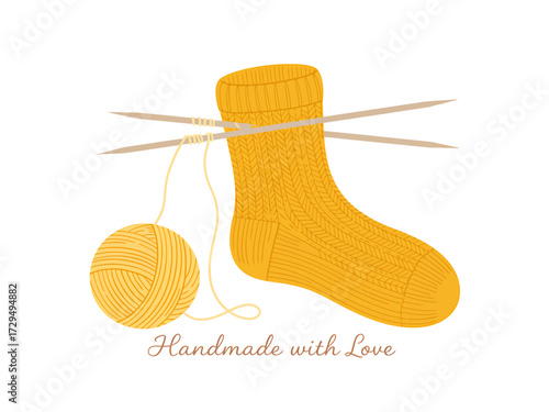 Yellow knitted sock with knitting needles isolated on white background