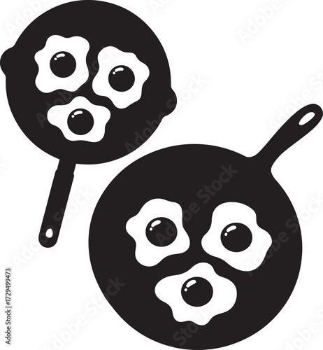 Two frying pans with fried eggs cooked in them silhouette isolated on white background