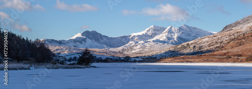 Fotografie Frozen Lake Panoramic over Llynnau Mymbyr, Capel Curig, with the Snowdon Range M