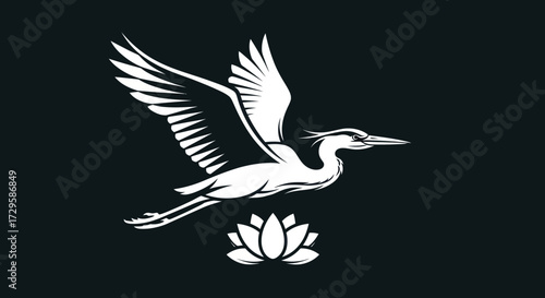 Elegant heron soaring above lotus flower symbol of grace and purity.
