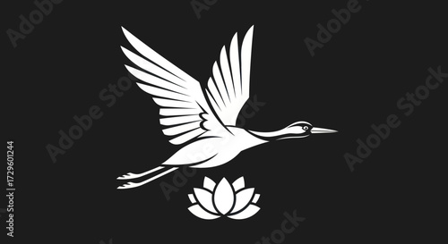 Graceful crane in flight above a blooming lotus flower.