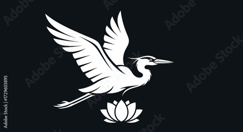 Elegant White Heron Flying Above a Lotus Flower.