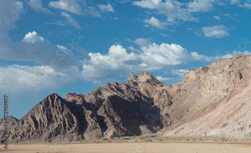 Baja California desert on the highway from Mexicali to San Felipe, MEXICO, on a sunny summer morning with a view of the mountains and a blue sky with clouds