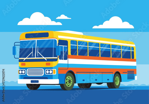 A colorful bus travels on a road under a blue sky with clouds